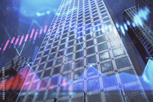 Forex chart on cityscape with tall buildings background multi exposure. Financial research concept.