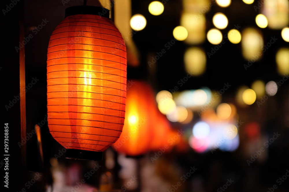 close up many traditional Chinese red lantern at dark night. Colorful blur lights background. - obrazy, fototapety, plakaty 