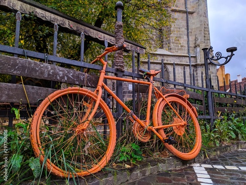 bicycle in front of old house