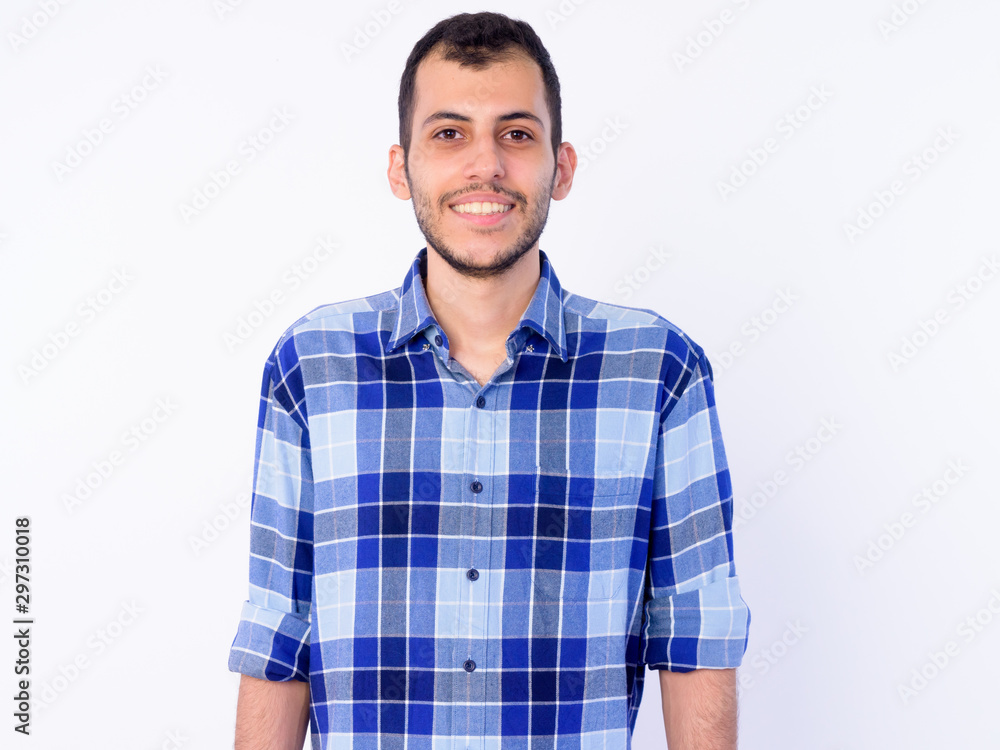 Portrait of happy young bearded Persian hipster man Portrait of happy young bearded Persian hipster man