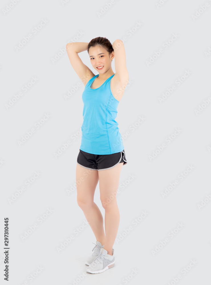 Beautiful portrait young asian woman standing workout stretch muscle arm with healthy isolated on white background, asia girl wear sport clothes exercise and yoga for health, wellness concept. Beautiful portrait young asian woman standing workout stretch muscle arm with healthy isolated on white background, asia girl wear sport clothes exercise and yoga for health, wellness concept.