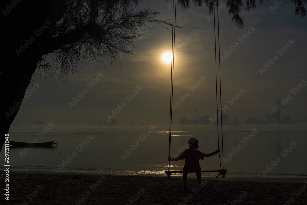 silhouette of man sitting on a bench at sunset silhouette of man sitting on a bench at sunset
