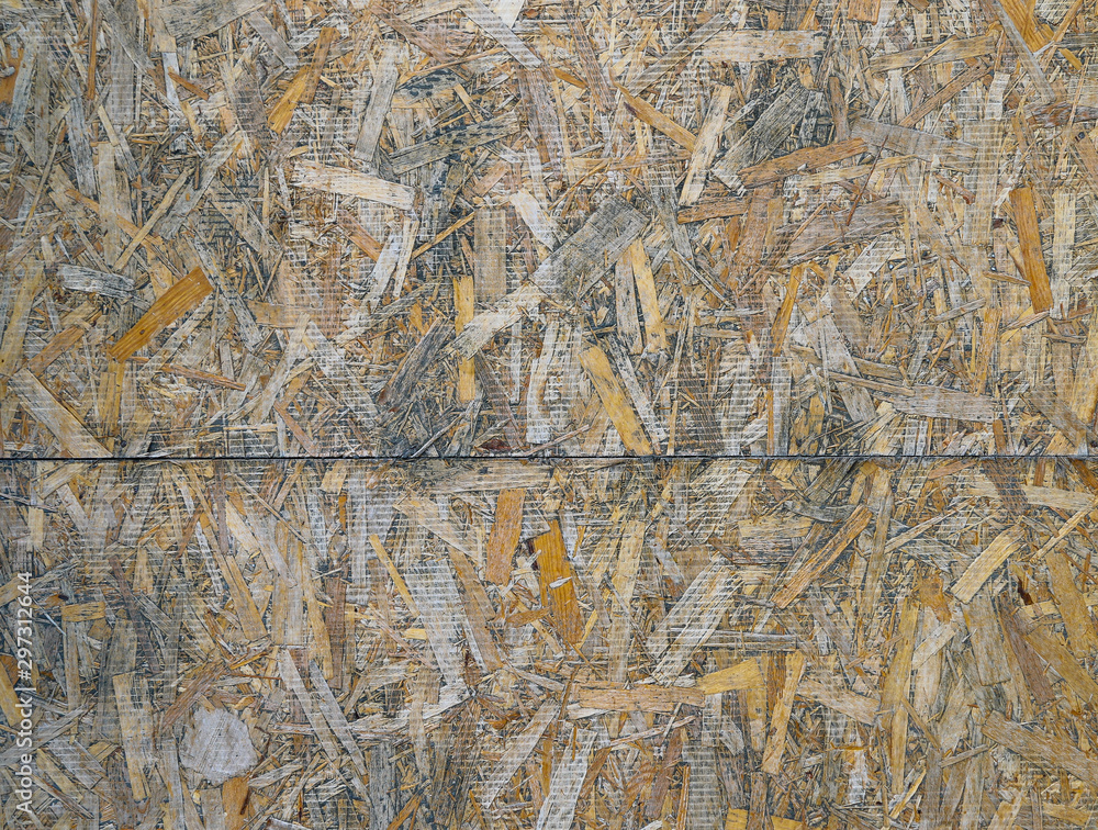 Texture of a wall made of two sheets of particleboard