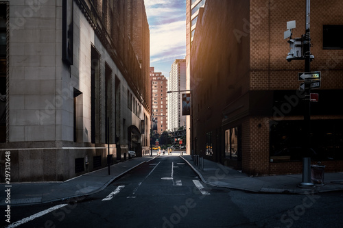 corner street in the city manhattan new york city summer afternoon street photography walking tourism urban exploration discover adventure fon route path leak flare light blue sky among buildings