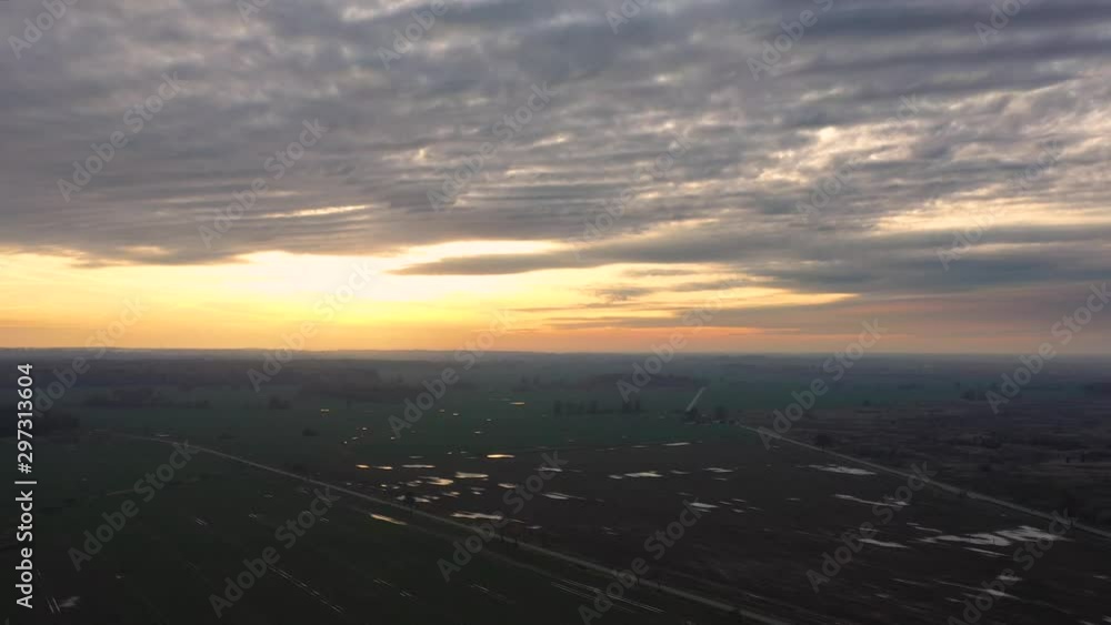 Aerial view of the sunset over field in autumn Aerial view of the sunset over field in autumn