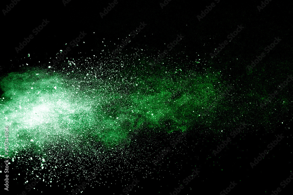 Green powder explosion on black background. - obrazy, fototapety, plakaty 