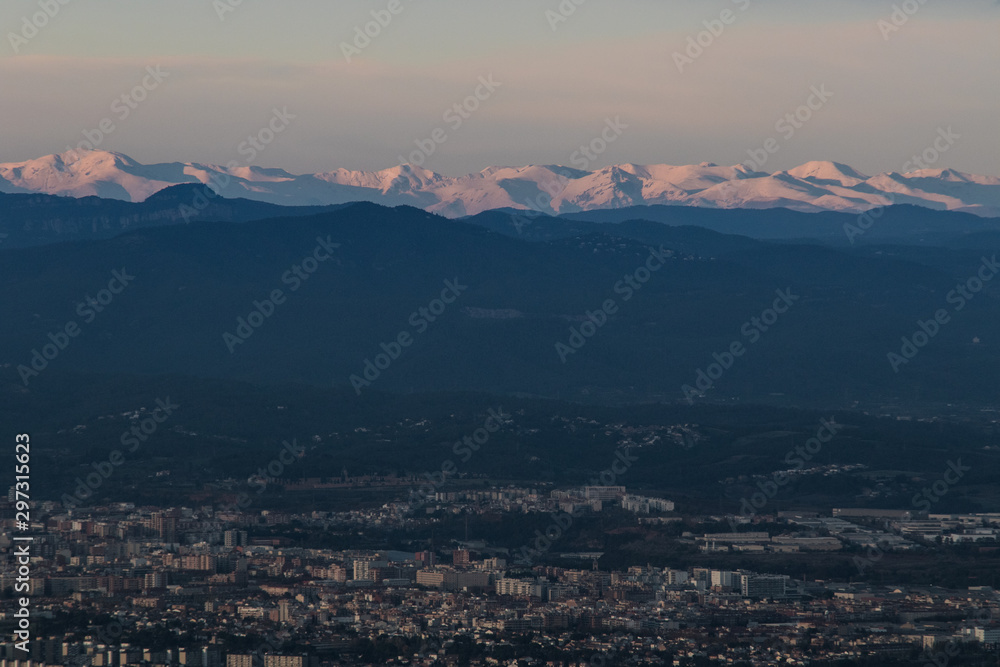 Panoramatic view of Pyrenees from top of Tibidabo in barcelona
