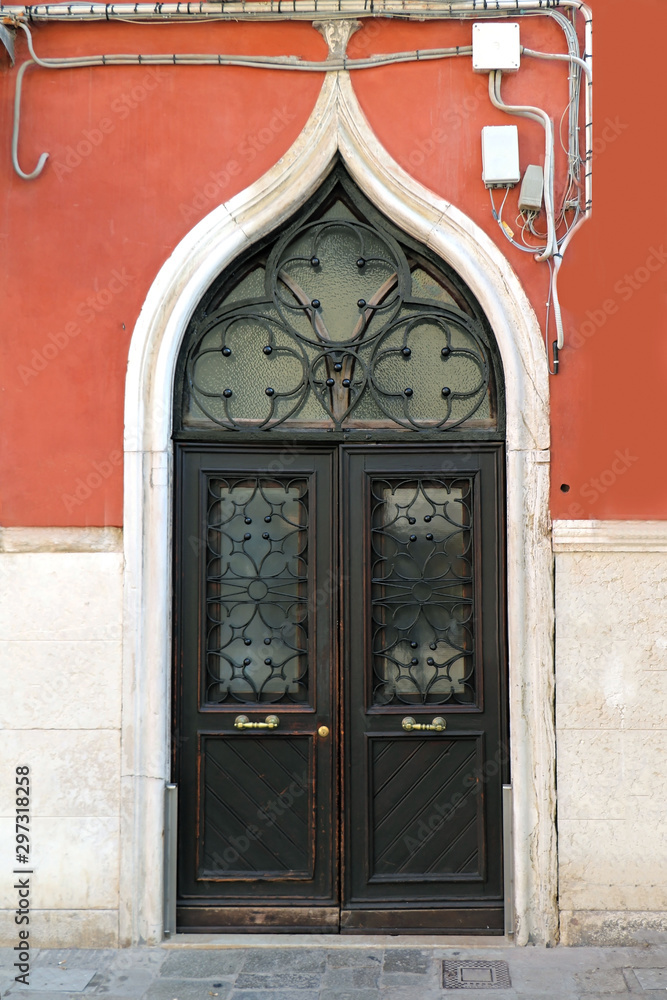 Decorative arch door
