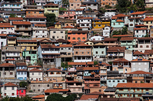The famous poor neighborhoods of the slums of Brazil and Rio de Janeiro. Favelas of the city of Ouro Preto. Panorama of poor houses in dysfunctional neighborhoods. © Tanya Hendel