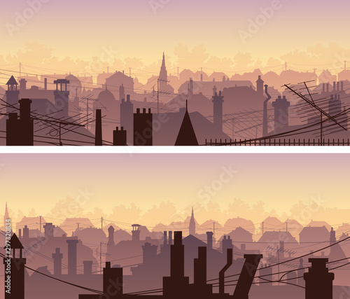 Horizontal banners of downtown roofs with antennas and chimneys at sunset.