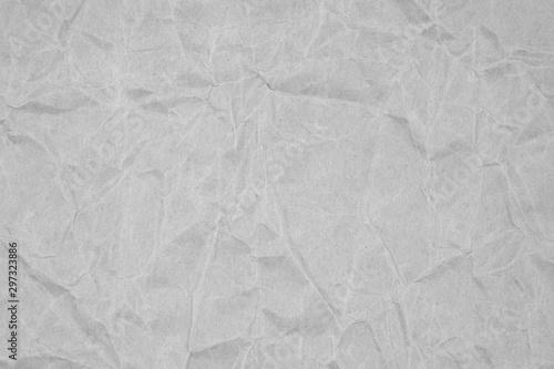 White crumpled packaging paper background texture. Grey Kraft Paper Coarse. Wrinkled paper bag