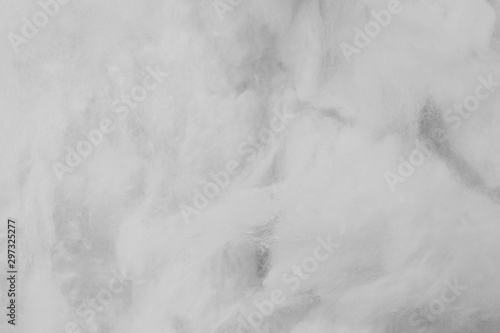 White cotton texture is soft, fluffy wadding background closeup