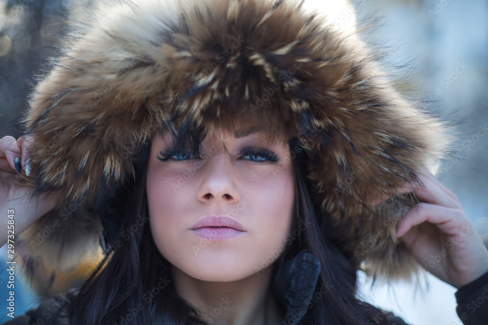 Beautiful young woman in a fur coat Beautiful young woman in a fur coat