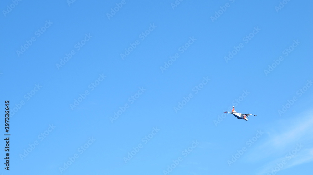 A small plane in the sky A small plane in the sky