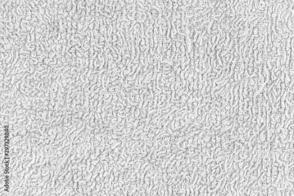 White natural texture of knitted wool textile material background. White cotton fabric woven canvas texture White natural texture of knitted wool textile material background. White cotton fabric woven canvas texture