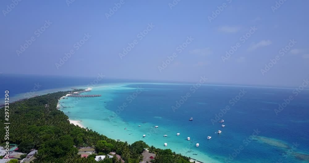 Peaceful island community in Palau - boats and fishing activities - 4K Aerial Shot Peaceful island community in Palau - boats and fishing activities - 4K Aerial Shot