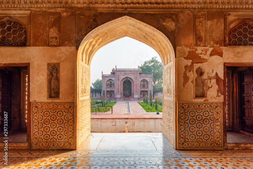 Scenic view of red sandstone building through arched gate, India