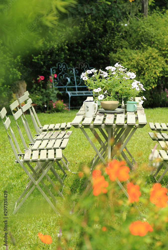Table arrangement in the english garden for parties. Selective focus.