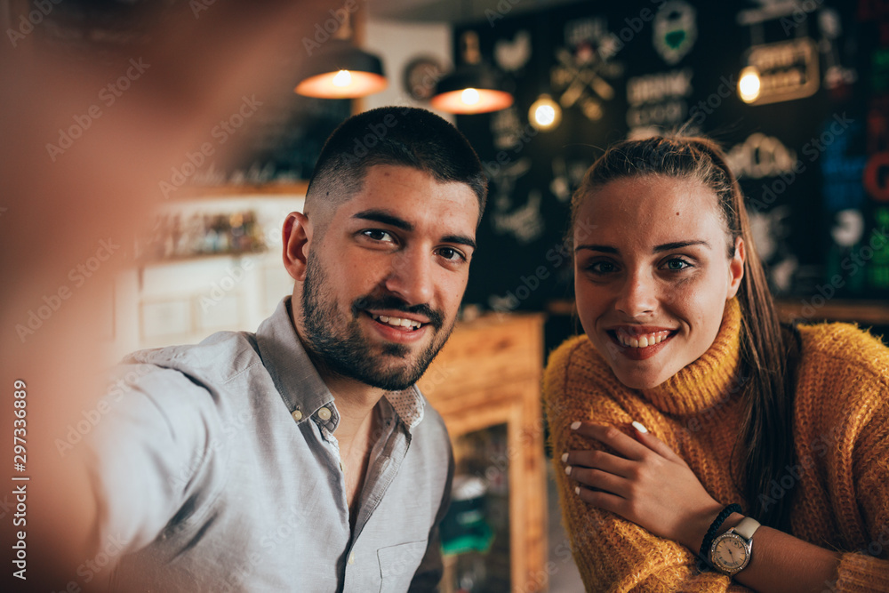 friends taking selfie picture in food corner bar friends taking selfie picture in food corner bar