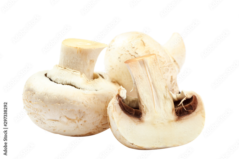 Fototapeta premium Fresh mushrooms champignons on white background.