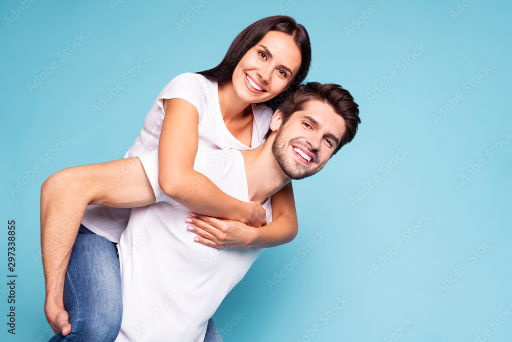 Portrait of his he her she nice attractive lovely charming cute sweet tender cheerful cheery soulmate piggybacking having fun isolated on bright vivid shine vibrant blue turquoise background Portrait of his he her she nice attractive lovely charming cute sweet tender cheerful cheery soulmate piggybacking having fun isolated on bright vivid shine vibrant blue turquoise background