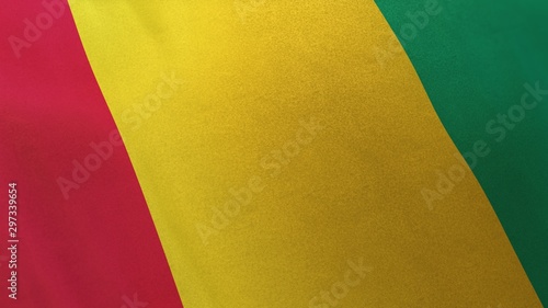 3D rendering of the national flag of Guinea waving in the wind. The  banner/emblem is made of realistic satin texture and rendered in a daylight situation.  photo
