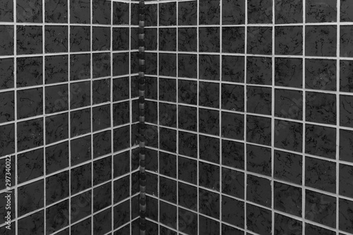 Black and white wall tile mosaic background texture. bathroom interior