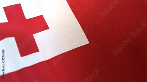 3D rendering of the national flag of Tonga waving in the wind. The banner/emblem is made of realistic satin texture and rendered in a daylight situation.  photo