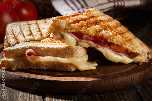 Panini with ham, cheese and lettuce sandwich