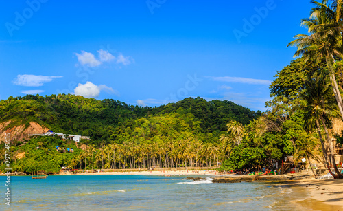 Tropical island landscape with beach and palms, Ipil beach, Palawan, Philippines photo