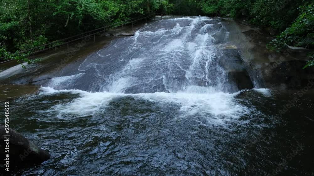 Sliding Rock, a popular waterfall and destination in Brevard, near Asheville, North Carolina in the Blue Ridge Mountains Sliding Rock, a popular waterfall and destination in Brevard, near Asheville, North Carolina in the Blue Ridge Mountains
