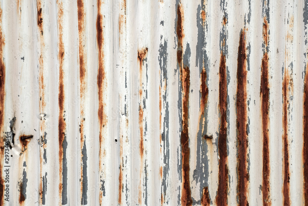 Old rusty zinc plate surface galvanized, corrugated iron siding vintage texture background. Rough surface. Old rusty zinc plate surface galvanized, corrugated iron siding vintage texture background. Rough surface.