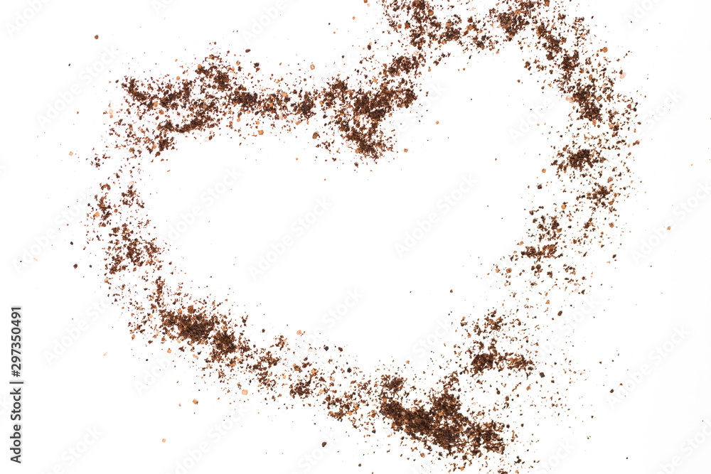 Coconut, coffee, chocolate scrub in the shape of a heart on white background. Care, love, Valentine's day concept