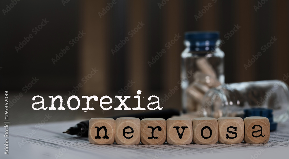 Naklejka premium Word ANOREXIA NERVOSA composed of wooden dices.