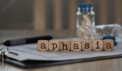 Word APHASIA composed of wooden dices.