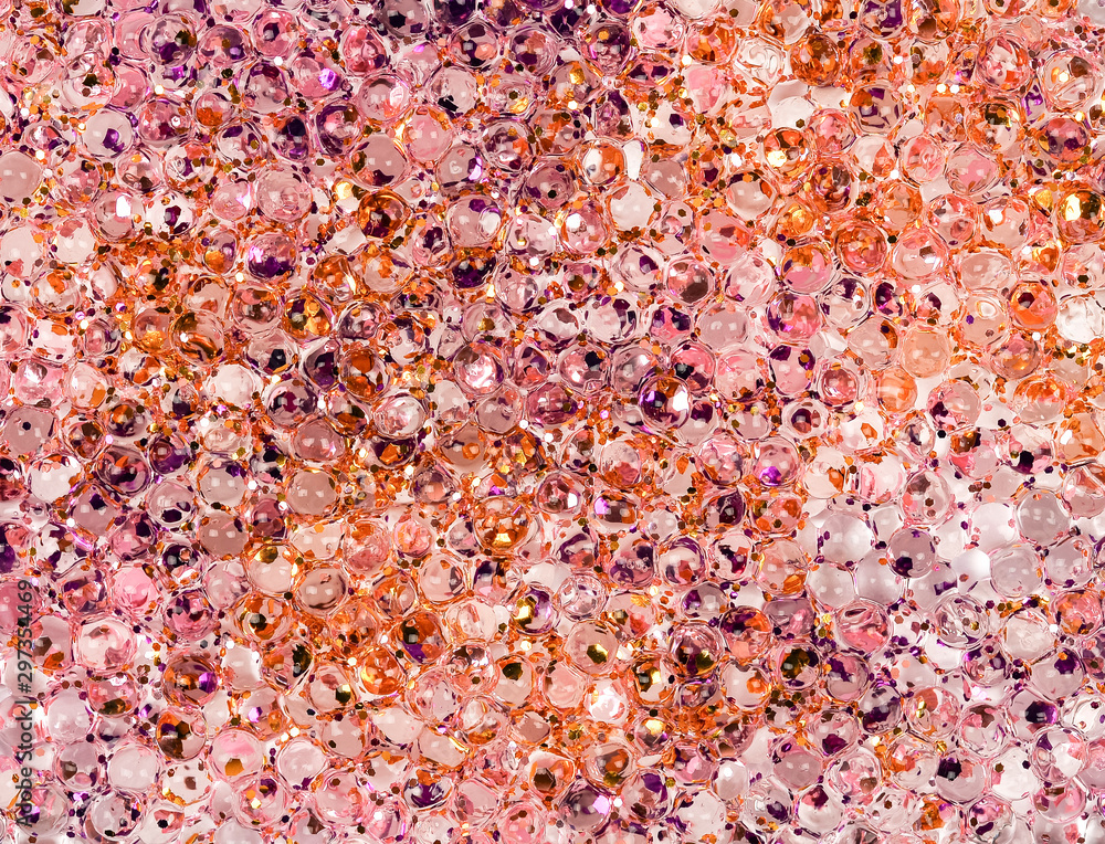 Fototapeta premium Pink, silver, violet and golden blurred sparkles on pink trendy background. Festive backdrop for your projects.