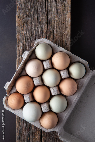 Overhead View of a Dozen of Multi-Colored Free Range Eggs photo