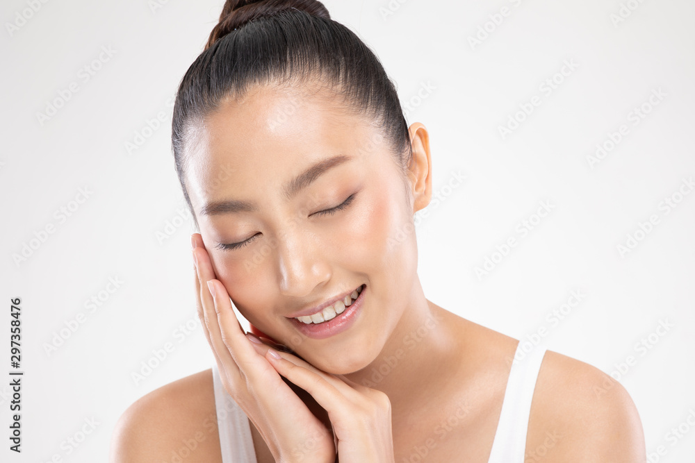 Beautiful Asian young woman close her eyes touching soft cheek smile with clean and fresh skin Happiness and cheerful with positive emotional,isolated on white background,Beauty and Cosmetics Concept Beautiful Asian young woman close her eyes touching soft cheek smile with clean and fresh skin Happiness and cheerful with positive emotional,isolated on white background,Beauty and Cosmetics Concept