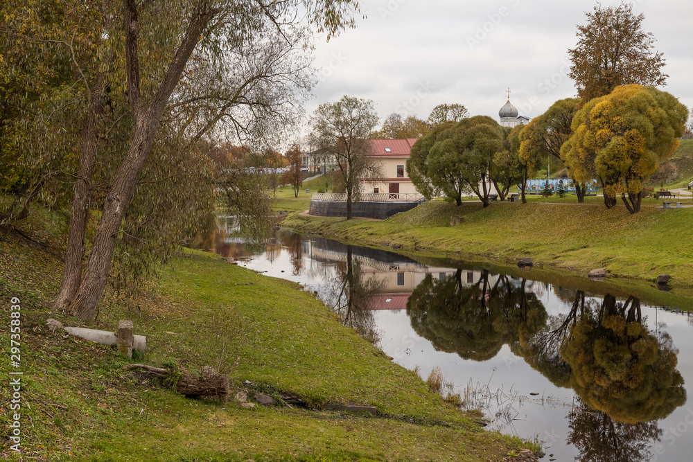 Pskov in October. The banks of the Pskova river and the Pskov Kremlin. Trinity cathedral, Pskov, Russia Pskov in October. The banks of the Pskova river and the Pskov Kremlin. Trinity cathedral, Pskov, Russia