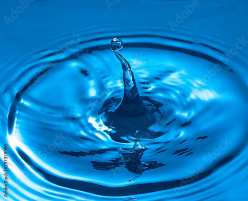 blue glass colored water drop splash