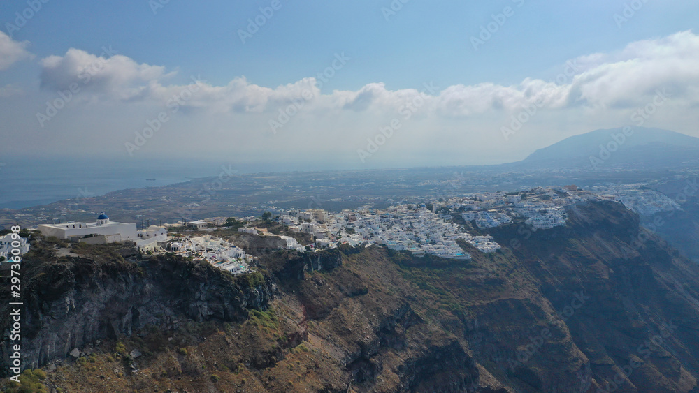 Aerial drone photo of famous church of Agios Nikolaos in Firostefani area with beautiful view to Caldera, Santorini island, Cyclades, Greece