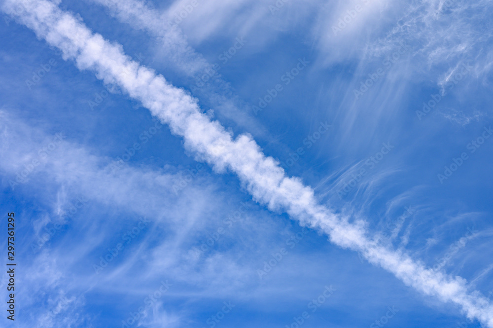 bright blue sky with cloud and trail from the plane bright blue sky with cloud and trail from the plane