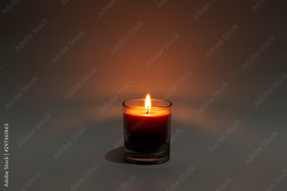 candle in a glass candle in a glass