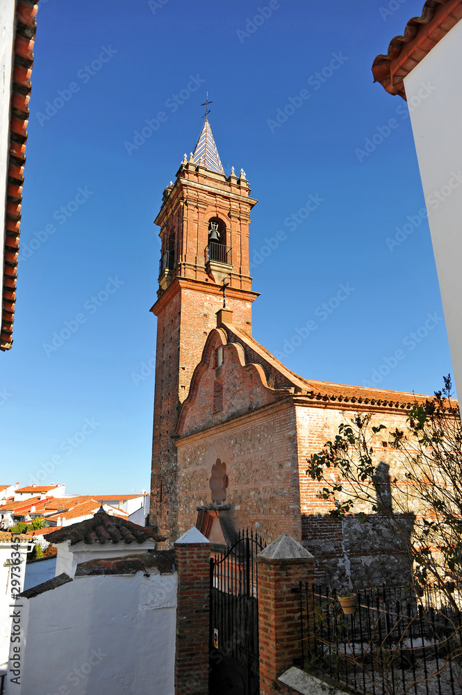 Obraz premium Parish church of the Holy Spirit (Espiritu Santo) in Fuenteheridos. Village of the Sierra de Aracena Natural Park in the province of Huelva, Andalusia, Spain