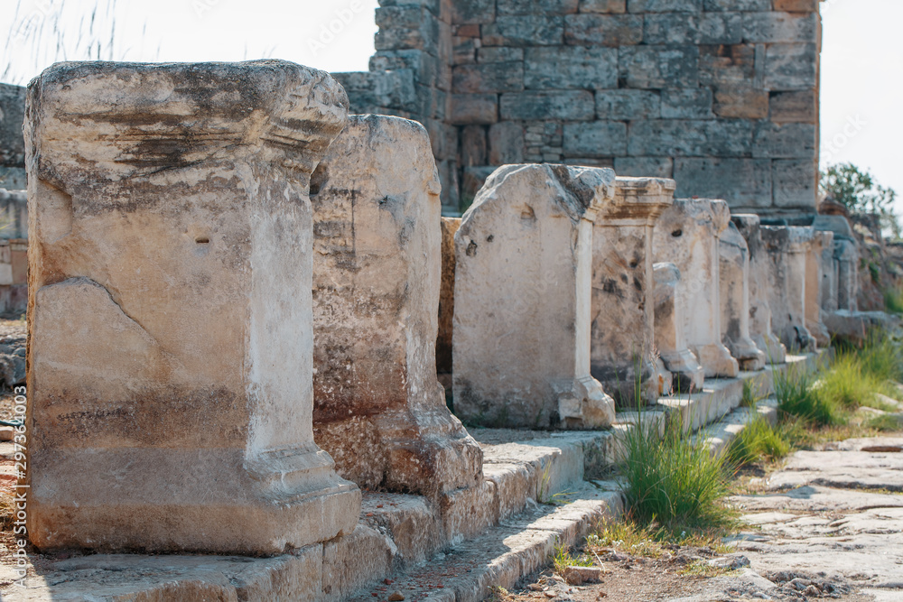 Columns of elements of buildings, parts of the ruins and antiquity of the ancient. City of Hierapolis