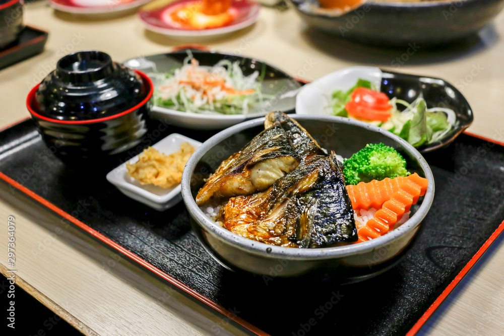 Saba fish grilled with teriyaki sauce and rice, focus selective. Saba fish grilled with teriyaki sauce and rice, focus selective.