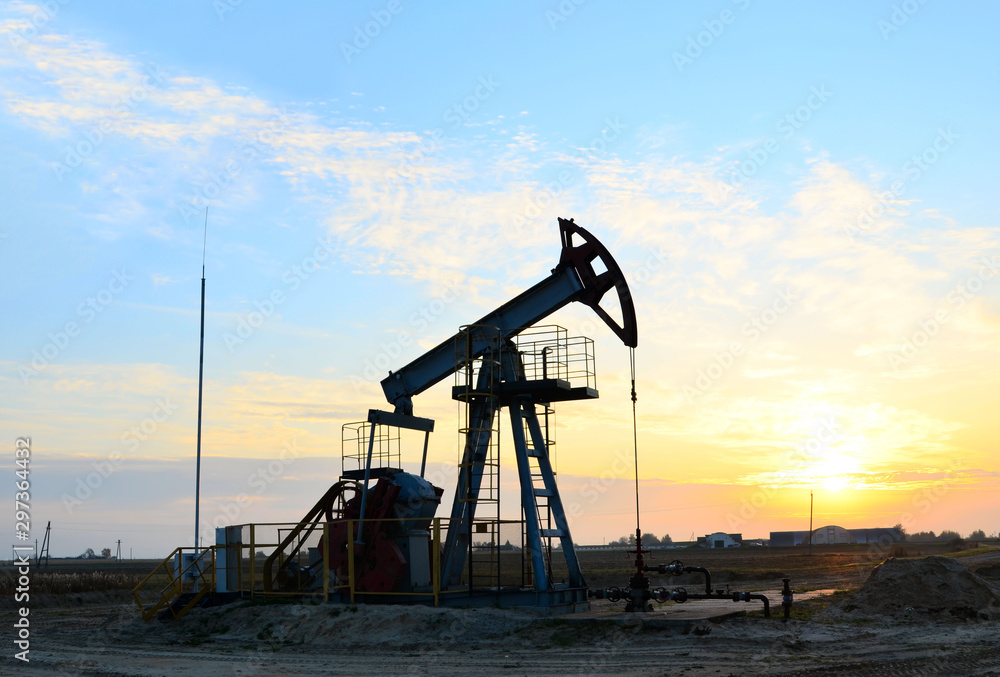 Oil drilling derricks at desert oilfield. Crude oil production from the ground. Oilfield services contractor. Oil drill rig and pump jack. Petroleum production, natural gas, liquids, NGL, additive. Oil drilling derricks at desert oilfield. Crude oil production from the ground. Oilfield services contractor. Oil drill rig and pump jack. Petroleum production, natural gas, liquids, NGL, additive.