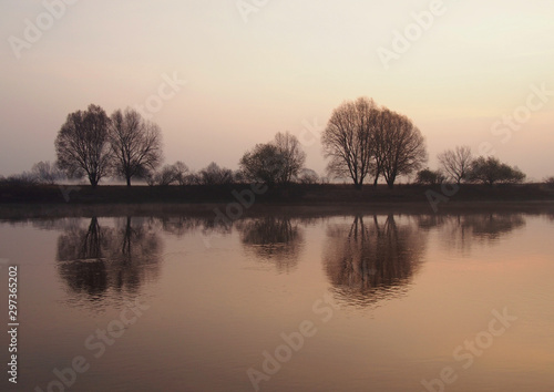 Beautiful views of the river during sunrise © goldika
