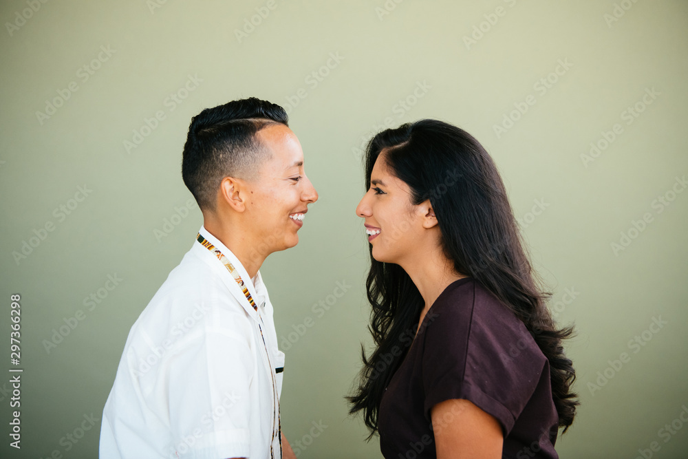 Portrait of queer couple in studio environment Portrait of queer couple in studio environment