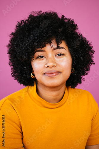 Portrait of an Afrolatina young woman in studio environment photo